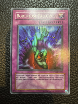 YuGiOh German - Bottomless Trap Hole CP04-DE003 (Super Rare) (VLP) - Image 1