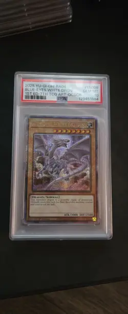2025 YU-GI-OH! RA04-QUARTER CENTURY STAMPEDE BLUE-EYES WHITE DRAGON PSA 10 - Image 1