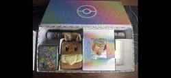 Prismatic Evolutions SPC Play Mat, Eevee Deck Box, Card Sleeves, Promo-No Packs - Image 1