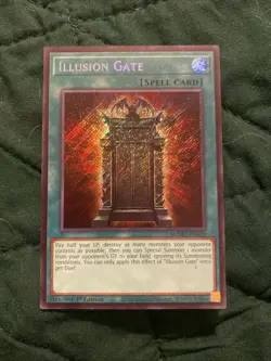 Yugioh Illusion Gate Spell Card Secret Rare 1st Edition Yu-Gi-Oh! TCG MZMU-EN023 - Image 1