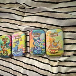 Pokemon TCG Mini Tin Lot of 4 Leafeon Vaporeon Glaceon Jolteon new sealed fresh - Image 1