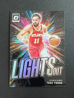 Trae Young 2024-25 Panini Donruss Optic Lights Out Holo Prizm #2 - Image 1