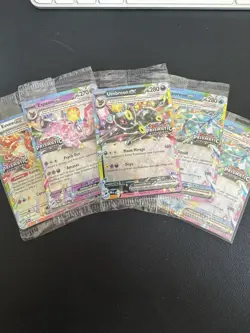 Prismatic Evolutions Surprise Box Sealed Stamped EX Promo Cards - Image 1
