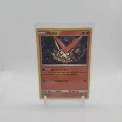 Victini 30/236 Cosmic Eclipse Holo Rare 2019 Pokemon TCG English - Image 1