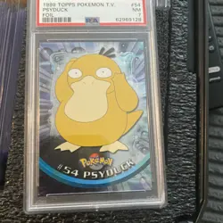 1999 TOPPS POKEMON T.V. PSYDUCK FOIL #54 PSA NM 7 - Image 1