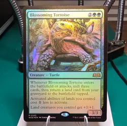 Wizards of the Coast Blossoming Tortoise Wilds of Eldraine Foil Mythic Green 163 - Image 1