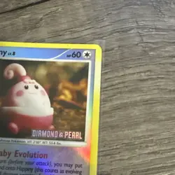 Pokemon TCG Diamond & Pearl Happiny 52/123 Stamped Reverse Holo Card - Image 4