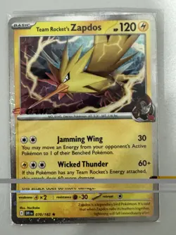 Team Rocket's Zapdos - 070/182 - EB Games Stamped Promo - Pokemon Card - SEALED - Image 1