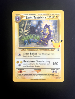 Pokemon LIGHT TOXTRICITY SWSH137 CELEBRATIONS HOLO RARE NM/M - Image 1