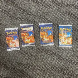 1999 Pokemon Base Set Charizard Art (EMPTY) Booster Pack Wrapper Lot Of 4 - Image 1