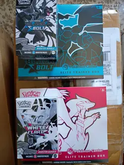Black Bolt and White Flare Pokemon Center Exclusive ETBs - and booster bundles - Image 1