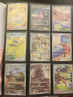100+ Assorted POKEMKN Non English NM CARD LOT *binder included* - Image 1