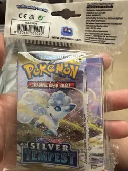 Pokemon TCG: Sword & Shield Silver Tempest Mini Portfolio + 1 Booster Pack - Image 1