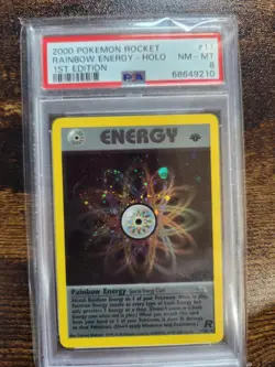 Rainbow Energy Holo 17 1st Edition Rocket Pokemon PSA 8 - Image 1