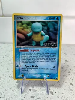 Ditto (Squirtle) 64/113 Reverse Holo Delta Species Card MP - Image 1