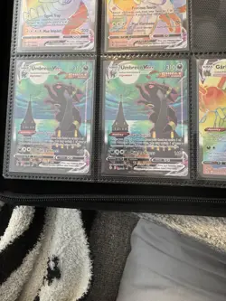 Evolving Skies Moobreons and Binder, Market Value Of All Cards Is Roughly 7600. - Image 1
