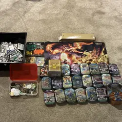 Pokemon tins,coins,charzard mat,evolving skies player guide,gold cards - Image 1