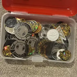 Pokemon tins,coins,charzard mat,evolving skies player guide,gold cards - Image 3