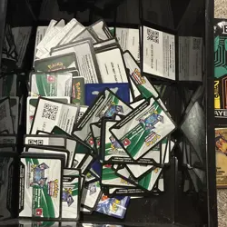 Pokemon tins,coins,charzard mat,evolving skies player guide,gold cards - Image 4