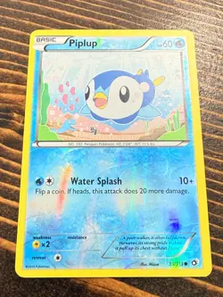 2013 Pokemon Basic Piplup Holo 33/113 Card TCG - Image 1