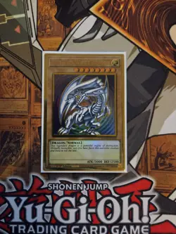 YUGIOH BLUE-EYES WHITE DRAGON MAGO-EN001 GOLD 1ST ED NM - Image 1