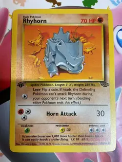 Pokemon - Rhyhorn 61/64 - Jungle 1st Edition - Image 1
