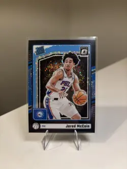2024-25 Optic - Jared McCain One of One 1/1 - Rated Rookie Black Disco 76ers - Image 1
