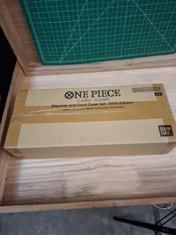 One Piece Card Game: Playmat and Storage Box Set - 25th Edition - Bandai Supply - Image 1