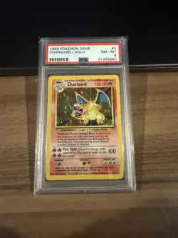 1999 Pokemon Base Set Charizard 4/102 Holo PSA 8 - Image 1