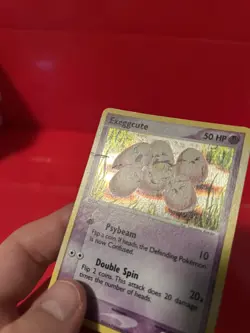 Exeggcute 33/112 Reverse Holo Pokemon Card DMG - Image 3