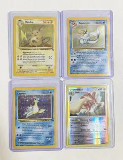 Vintage Pokemon Holo Lot – Raichu Base, Vaporeon Jungle, Lapras Fossil + Lopunny - Image 1
