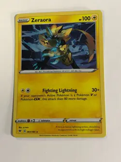 Pokemon TCG Promo Cosmos Holo Vivid Voltage Zeraora 061/185 w Swirl NM - Image 1