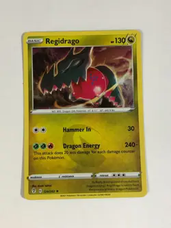 Pokemon TCG Evolving Skies Cosmos Holographic w Swirl Regidrago 124/203 NM - Image 1