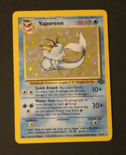 Vaporeon 12/64 1999 Vintage Pokemon Holographic Shiny Foil Holo Card - Image 1