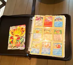 280 Pokemon cards plus the binder included with Pikachus and Charizards￼￼ - Image 1
