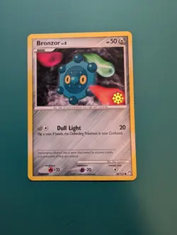 Pokemon Card 2007 Countdown Calendar Promo Bronzor 74/123 NM - Image 1
