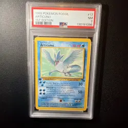 1999 Pokemon Fossil #17 Articuno 1st Edition PSA 7 - Image 1
