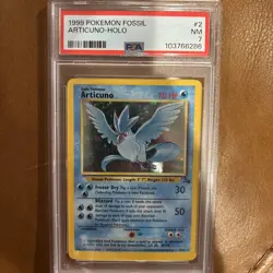 1999 POKEMON FOSSIL 1ST EDITION #2 ARTICUNO-HOLO PSA 7 - Image 1