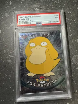 1999 TOPPS POKEMON T.V. PSYDUCK FOIL #54 PSA NM 7 - Image 1