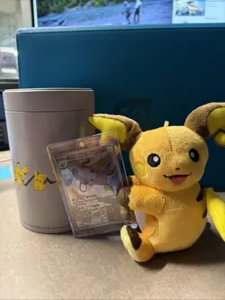 Pokemon Chinese Nuzzle Plush Card Display With Tin 091/SV-P Promo Raichu Opened - Image 1