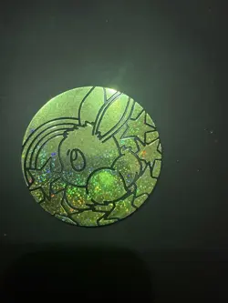 Eevee Jumbo Coin Light Green Prismatic Evolutions - Pokemon Cards TGC - Image 1