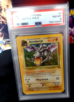1999 Pokemon Fossil Aerodactyl Holo 1/62 PSA 8 - Image 1