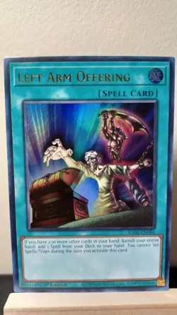 Left Arm Offering 1st Edition [NM] - Yu-Gi-Oh! RA04 [Ultra Rare] - Image 1