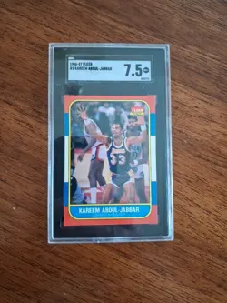 1986-87 Fleer #1 Kareem Abdul-Jabbar Los Angeles Lakers SGC 7.5 NM+ HOF - Image 1
