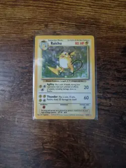 Pokemon TCG Raichu Card 14/102 Base Set Unlimited Holo Rare - Image 1