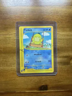 Pokemon TCG Aquapolis Psyduck Card 104/147 2002 Ungraded/ Damaged - Image 1