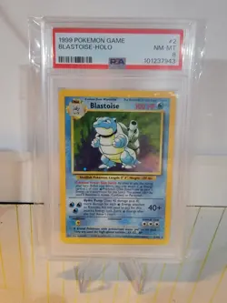 Pokemon TCG | Blastoise 002/102 Base Set Holo | PSA 8 - Image 1