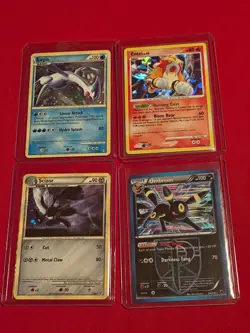 Pokemon Four (4) Holo Card Lot with Lugia, Entei, Scizor, and Umbreon holo rares - Image 1