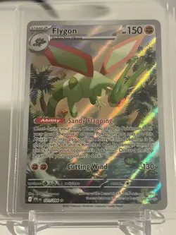 The Pokemon Company Flygon 101/094 Me02: Phantasmal Flames IR Holo EN 150HP - Image 1