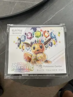 Pokemon Center Prismatic Evolutions ETB Elite Trainer Box With Acrylic Case - Image 1